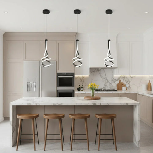 Modern kitchen with pendant lights and white cabinetry